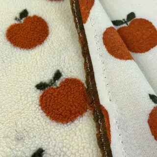 Päällystakkikangas TEDDY JACQUARD Apples