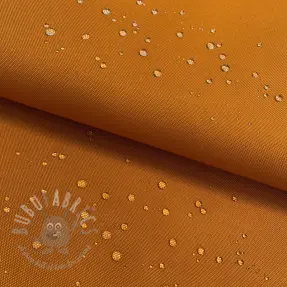 Tuulipukukangas vedenhylkivällä käsittelyllä honey