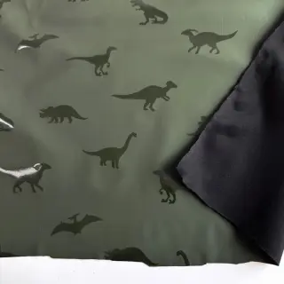 Látka na pršiplášť Dinosaurs dark green